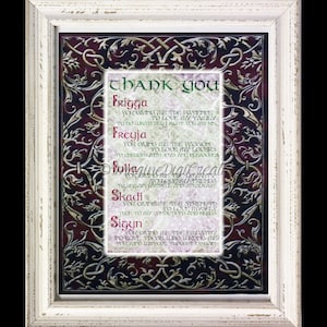 May include: A framed print with a dark red background and gold accents. The print features a thank you message with a list of Norse goddesses and their associated virtues. The text reads "Thank You" followed by the names "Frigga", "Freyja", "Fulla", "Skadi", and "Sigyn" with a description of each goddess's virtue.