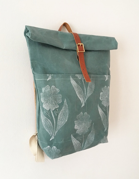 Blue green waxed canvas roll top backpack with hand block printed pattern roll top waxed canvas rucksack Blue green waxed canvas roll top backpack with hand block printed pattern roll top waxed canvas rucksack