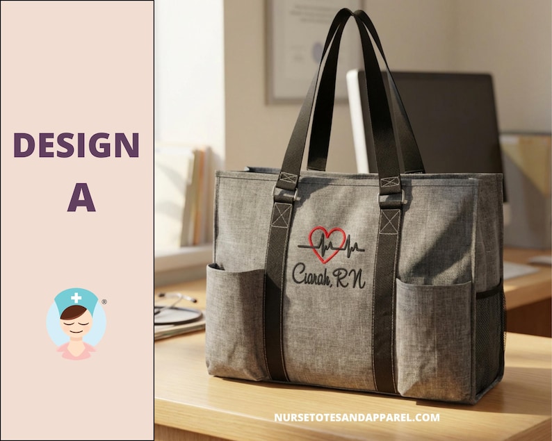 May include: Gray tote bag with black straps and side pockets. Features a red heart and heartbeat design with the name "Ciarah, RN" embroidered in black. The bag has a professional and functional design.