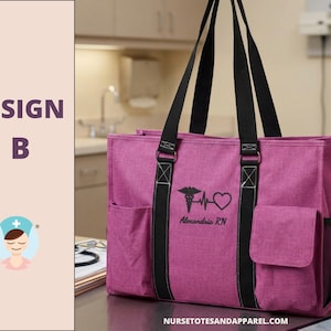May include: A magenta tote bag with black straps and accents. The bag features a medical symbol, heartbeat, and heart graphic, along with the text "Alexandria RN". It has side pockets and a mesh pocket. The bag is designed for nurses.