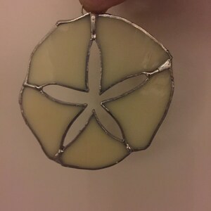 Colored sand dollars sun catcher