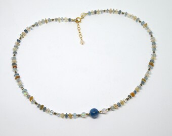 Semi-precious stone necklace with blue/turquoise stone.