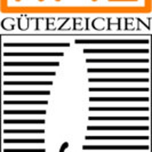 Pode incluir: Um r&oacute;tulo RAL G&uuml;tezeichen branco e laranja com a palavra "KERZEN" impressa em preto abaixo do logotipo.