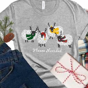 フリース ナビダッド シャツ：レディース クリスマス T シャツ、ウィンター ホリデー トップ