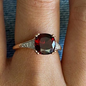 14k Rose Gold Ring with Cushion Cut Garnet and Diamond Accent Stones