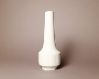 Tall, slender white porcelain vase with relief pattern, bulbous with long neck, Ref. 2047