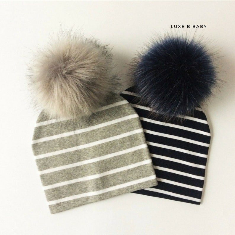 baby toques with pom pom