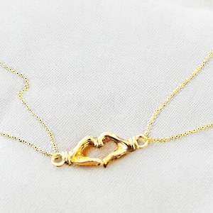 Conjunto de collar magnético de manos y corazón: joyería de acero inoxidable para parejas