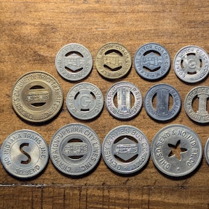 Indiana Towns: Elkhart, Fort Wayne, Gary, Goshen, Indianapolis, Muncie, South Bend One Fare Coin Transit Token Lot of 14 Different Pieces