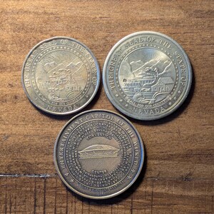 Nevada State Seal 36th State From Hoist to Highrise + Los Vegas Dollar (Morgan Dollar Design) Entertainment Capital Token Lot of 3