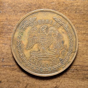 Los Angeles, California CA Roberts Public Markets 25 Cents Southern California Eagle Pictorial Trade Token