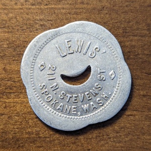 Spokane, Washington WA Lewis Cigars 211 N. Stevens St. Good For 25 Cents Scalloped Shape Trade Token