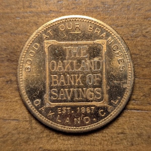 Est. 1867 Oakland, California CA The Oakland Bank of Savings 50 Cents Towards Five Dollar Bank Account Trade Token