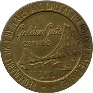 May include: A vintage brass casino token from the Golden Gate Casino. The token features an embossed image of the Golden Gate Bridge and the casino's name. The text around the edge reads "Redeemable Only By Player And Only At The Golden Gate Casino".