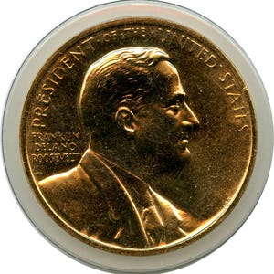 May include: A circular gold-coloured commemorative medal featuring a profile portrait of Franklin Delano Roosevelt facing right. The text PRESIDENT OF THE UNITED STATES is arched along the top, with FRANKLIN DELANO ROOSEVELT inscribed on the left side.