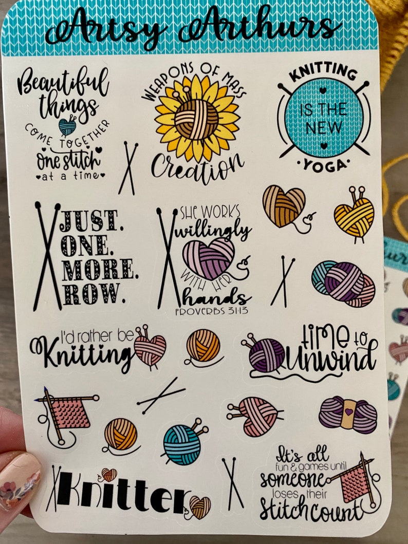 May include: A sheet of colorful stickers with knitting-themed designs. The stickers feature sayings like "Just one more row", "I'd rather be knitting", "Knitting is the new yoga", and "Time to unwind".