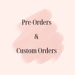 May include: A pink watercolor background with the text "Pre-Orders & Custom Orders" in black.