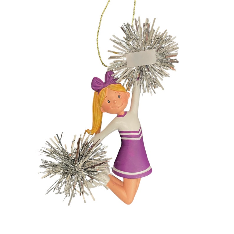 May include: A purple and white cheerleader ornament with blonde hair and silver pom-poms. The ornament has a blank tag for personalization.