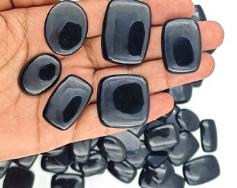 天然ブラックオニキス宝石、高級ジュエリーデザインや職人作品のための深みのある黒色の研磨カボション、手作りの卸売石。