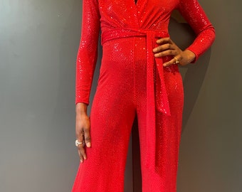 Sparkle jumpsuit in red flat sequin fabric with belt