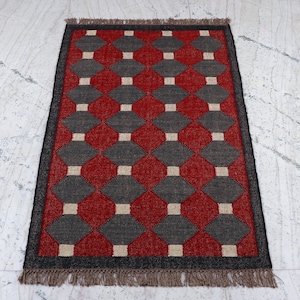 Handgeweven wollen jute kelimtapijt: boho dhurrie platgeweven