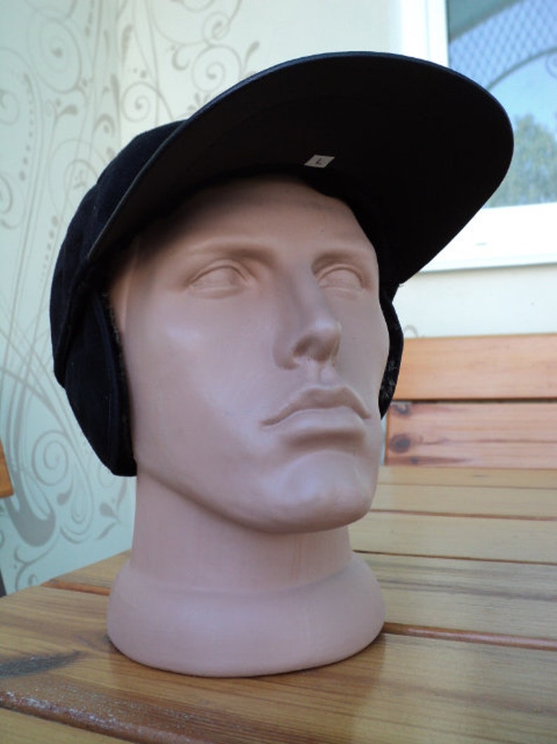 a winter cap a youth cap a men/'s baseball cap artificial leather a black cap, fur a warm hat A classic baseball cap a visor