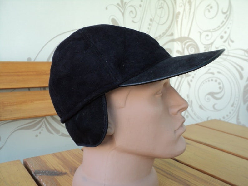 a winter cap a youth cap a men/'s baseball cap artificial leather a black cap, fur a warm hat A classic baseball cap a visor