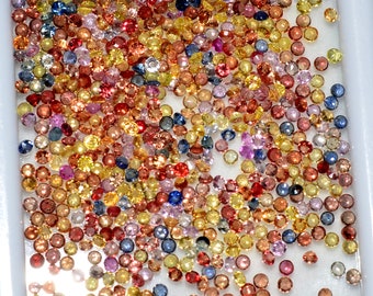 1,5 mm naturliga multisafirer Parti: 100 stycken rundslipade lösa ädelstenar, 2,03 ct