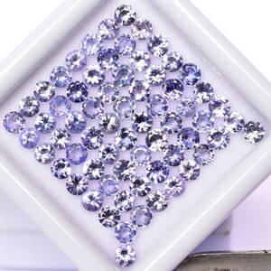 Lustrous Blue Tanzanite Gemstone Lot: 33 Faceted Round Cuts, 5.52 Cts