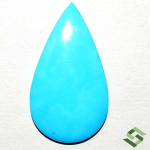 Puede incluir: Una piedra preciosa turquesa en cabujón de forma de lágrima, de color azul brillante.