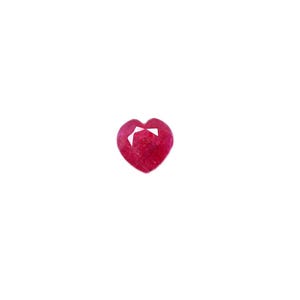 May include: A heart-shaped ruby gemstone with a deep red color.