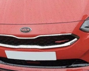 May include: Close-up of a red Kia car's front end. The Kia logo is centered above the grille, with a chrome trim. The car has a black lower bumper and a white license plate area. The word "GT" is visible on the grille.