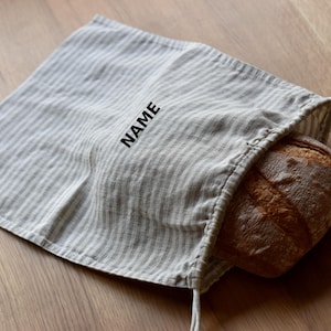 Bestickter Brotbeutel aus Leinen zur Aufbewahrung von Lebensmitteln, mit Kordelzug. Nachhaltige und natürliche Art, die Produkte zu behalten, personalisierte Leinentasche