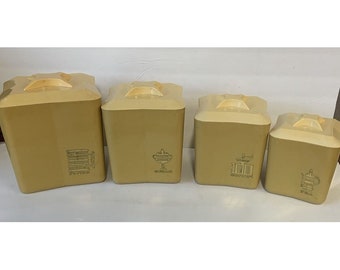 Vintage 1950s-60s Plastic Kitchen Canister set (4) Retro MCM Nesting Gold Yellow