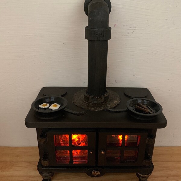 12th Scale Dollhouse fireplace range, with  LED Flickering Lights. No wires. All self contained !