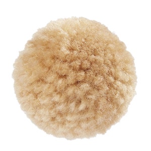 May include: A large, fluffy, beige pom pom. The pom pom is made of yarn and is round in shape.