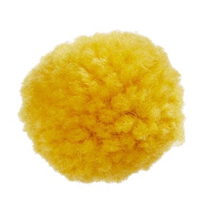 May include: A bright yellow fluffy pom pom, a round ball of yarn, perfect for adding a touch of whimsy to crafts and projects.