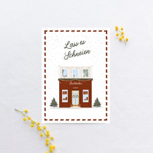 Weihnachtspostkarte - Buchladen / Lass es schneien