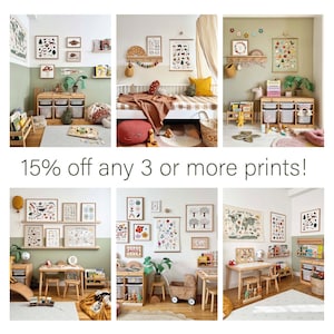 May include: A collection of colorful framed prints featuring nature-themed illustrations, displayed in a playroom setting with wooden furniture and toys. The prints include images of animals, plants, and maps. The text "15% off any 3 or more prints!" is visible at the bottom of the image.