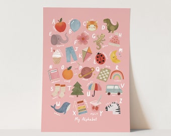 May include: A pink alphabet chart with colorful illustrations of objects starting with each letter. The chart includes an apple, balloon, cat, dinosaur, elephant, flower, gecko, hat, ice cream, jeans, kite, ladybug, moon, notebook, orange, planet, quilt, rainbow, socks, tree, umbrella, van, whale, xylophone, yogurt, and zebra.
