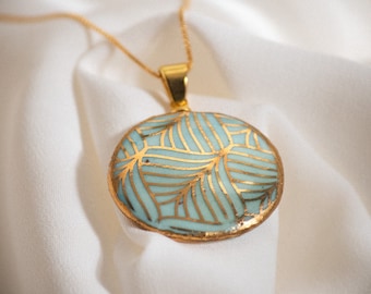 Turquoise porcelain necklace with geometric gold pattern, round | Unique handmade ceramic jewelry | Silver 925 gold plated