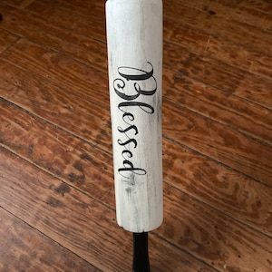 Up cycled Farmhouse decor rolling pin. Black & White chalk paint says “Blessed”