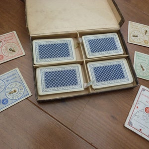 De La Rue Bezique game Complete with 4 decks playing cards 4 markers and rules booklet Bezique and Rubicon Bezique
