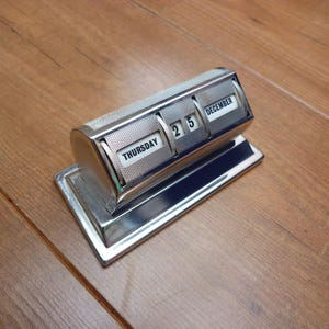 Vintage Metal Perpetual Flip Calendar 1930s by Velos. Black