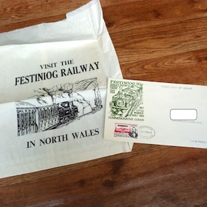 Festiniog Railway Letter Service First Day Cover and Wales 5d Wilding from 1969 plus Souvenir Paper Bag
