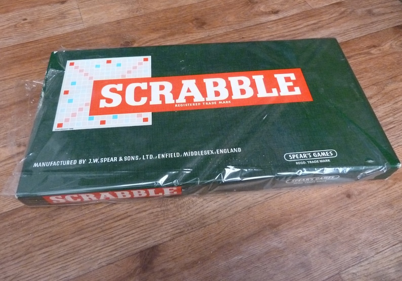 Vintage Scrabble board game by Spear's Games dated 1955. Complete original set: Board, racks and 100 letter tiles. Made in England word game Unopened sealed box