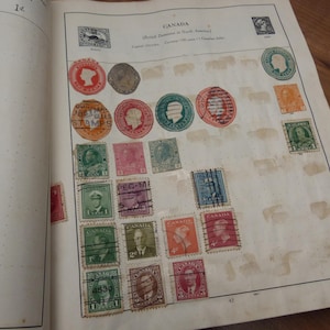 Vintage Stamp Album over 800 World Stamps 1900s-1950s Americas Europe Asia Australasia 340 pages Stanley Gibbons Strand Album