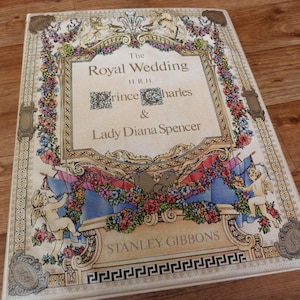 1981 Charles and Diana Royal Wedding Stamp Album Mint Commemorative Sets with 330 QEII Commonwealth Stamps in Stanley Gibbons Folder N-Z