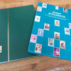 Two WH Smith Stamp Stock Books with 32 and 16 White Pages Stamp Collector Book