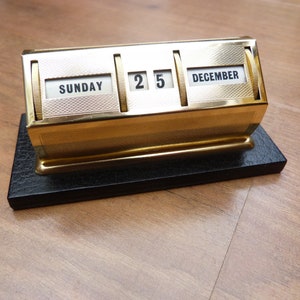 Vintage Perpetual Desk Calendar Gold/Brass Colour on black base 1970s Vintage